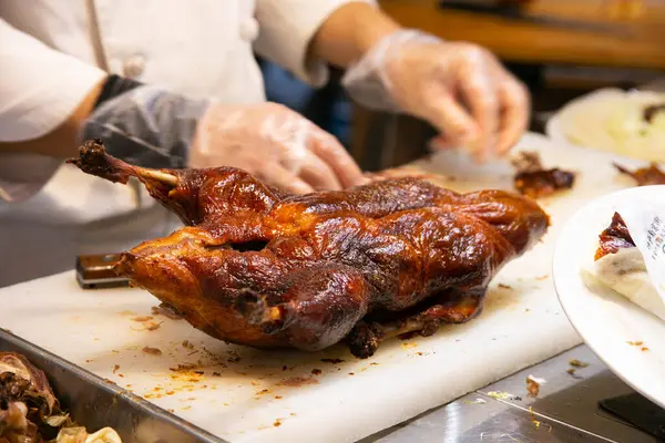 Crispy Peking duck cooked in the Chinese district of Nankinmachi in the city of Kobe in Japan.