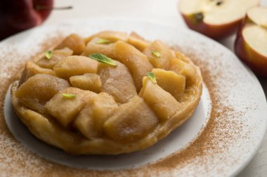 Tarte Tatin is a variant of apple pie in which the apples have been caramelized in butter and sugar before adding the dough. clipart