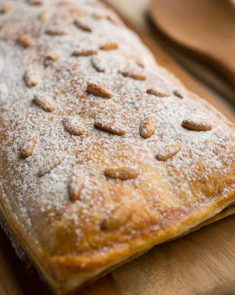 stock image Chocolate San Juan Coca. Traditional San Juan cake to celebrate the arrival of summer in Spain made with puff pastry and cocoa cream.