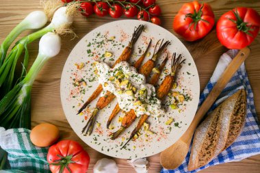 Fırında havuç, İtalyan burrata ve şam fıstığı..