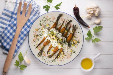 Fırında havuç, İtalyan burrata ve şam fıstığı..