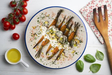 Fırında havuç, İtalyan burrata ve şam fıstığı..