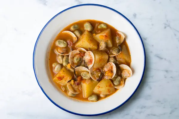 Stock image Clam stew with potatoes and beans. Traditional Spanish recipe.