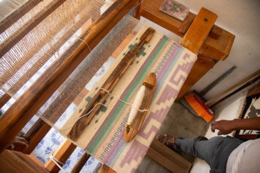 Atelier and machinery for the artisanal production of Mexican rugs in Teotitlan del Valle, Oaxaca Mexico. clipart