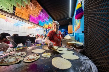 Oaxaca, Mexico; 1st January 2025: Famous stall selling mamelitas and breakfasts from Doa Vale from Netflix at the Oaxaca food market. clipart