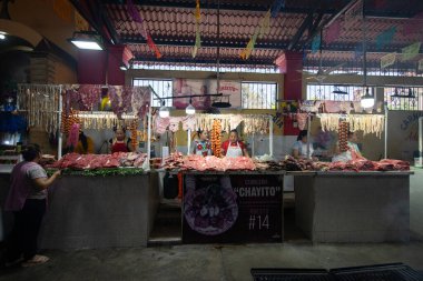 Tlacolula, Mexico; 1st January 2025: Vendor stalls and market atmosphere at the colorful indigenous vendor market in Tlacolula, Oaxaca. clipart