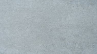 Çatı katı tarzında dekore edilmiş beyaz ve gri çimento duvar arka planı.