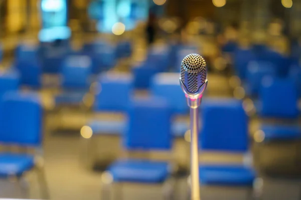 Microphone over business people forum Meeting, microphone in meeting room on table with selective focus, Close-up mic for speaker speech presentation backgrounds, Conference Training Concept