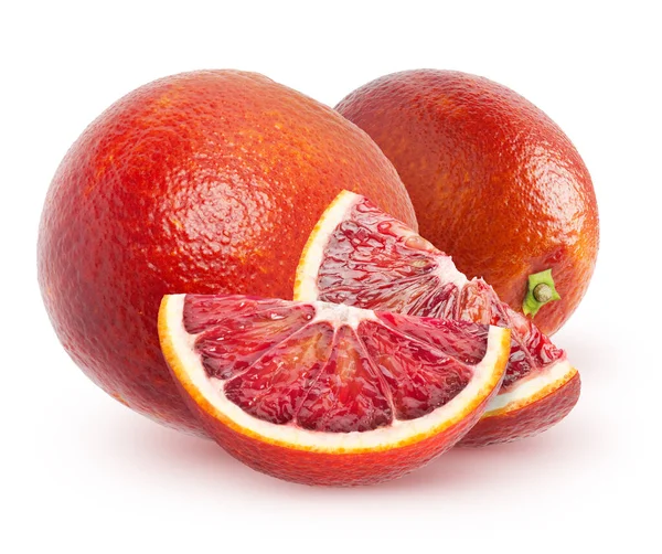 stock image Isolated blood oranges. Two whole orange fruits with slices isolated on white background with clipping path