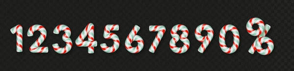 Рождественские конфеты трость номера с ярко-красными, зелеными и белыми полосами.