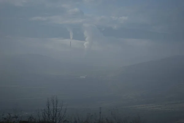 Foggy industrial scenery in small mining town of Pljevlja, Montenegro