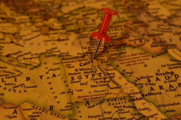 Vintage map of Egypt with a pin on a Cairo