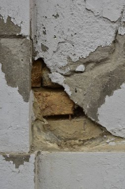 Old damaged brick wall concept background