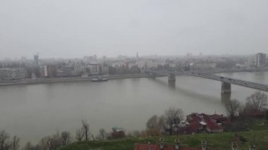 Novi Sad city panorama on a cloudy, rainy day with a Danube river view