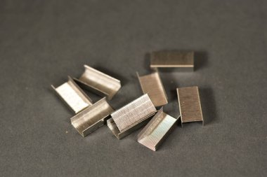 Staples on a black background 