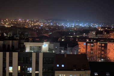 night panorama of a brutalist styled city