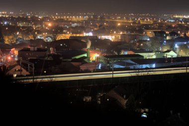 night panorama of a brutalist styled city