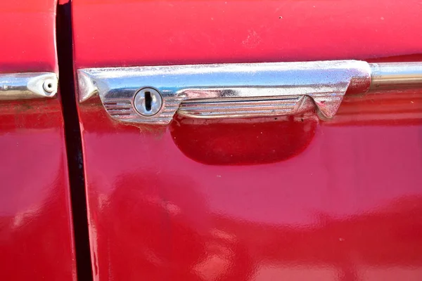 stock image Details of Fiat 1300 in red color on a parking lot under sun