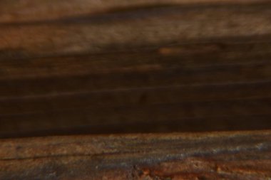 Koyu kahverengi ahşap arkaplanı kapat