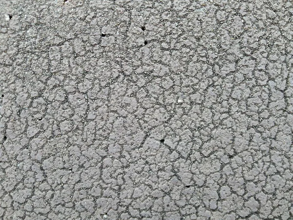 Closeup gray concrete tiles roof. Closeup texture. Gray background