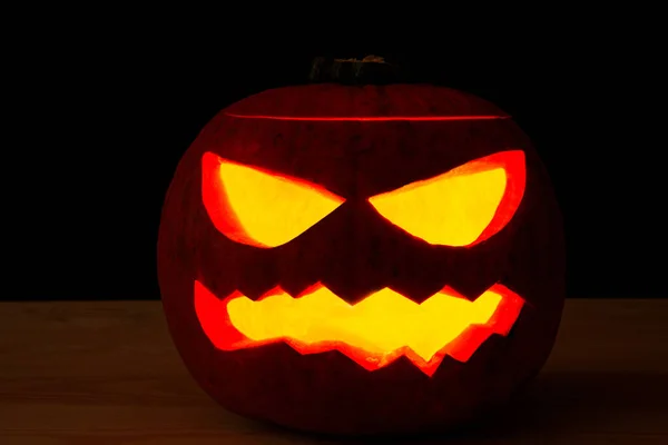 Kísérteties Halloween Tök Egy Fekete Háttér — Stock Fotó