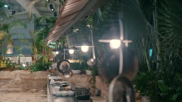 Vintage Outdoor Kitchen Beautiful Lamps Tropical Plants Event Garden Night — Stock video