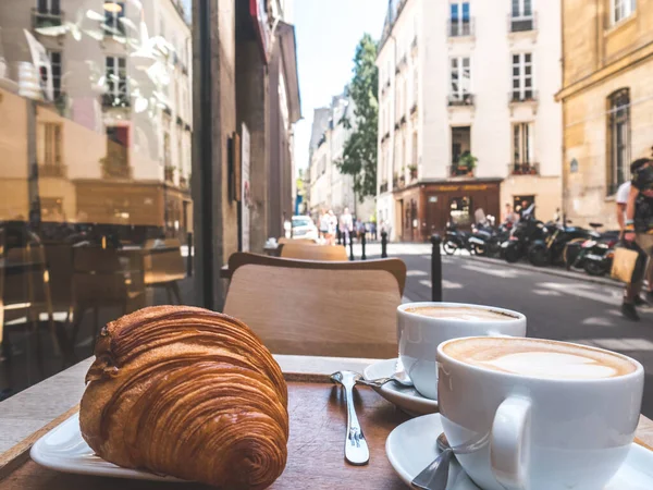 Morning breakfast in Paris with Coffee and croissant