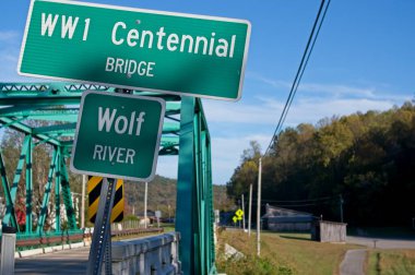 Sign for the WWI Centennial Bridge over the Wolf River in Pall Mall, TN clipart