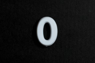 Letter O on a black background clipart