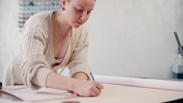Clothing Designer Draws Patterns Workshop — Stockvideo