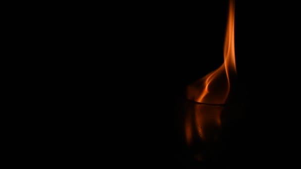Burning Candle Flame Glass Surrounded Dark Background — Αρχείο Βίντεο