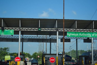 A Road Direction Board on National Highway 37 of Assam showing distance of places