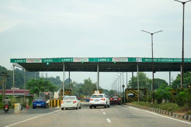 A Road Direction Board on National Highway 37 of Assam showing distance of places