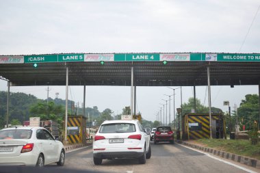 A Road Direction Board on National Highway 37 of Assam showing distance of places