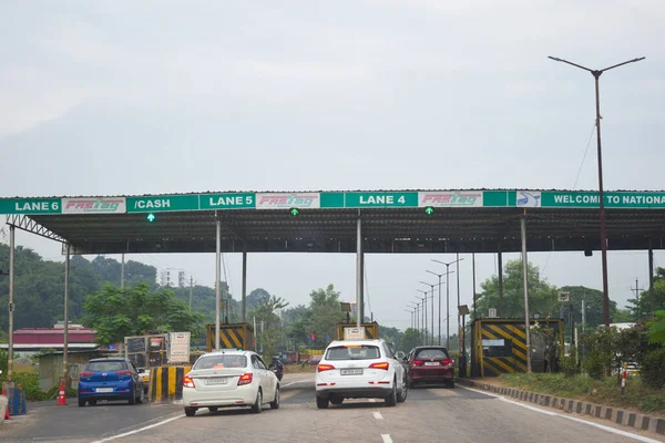 A Road Direction Board on National Highway 37 of Assam showing distance of places