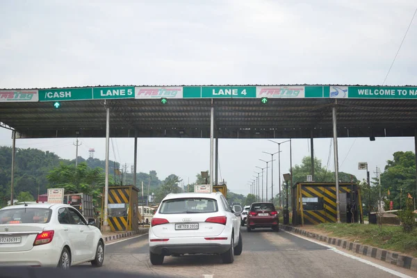 A Road Direction Board on National Highway 37 of Assam showing distance of places