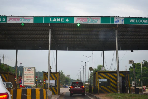 A Road Direction Board on National Highway 37 of Assam showing distance of places