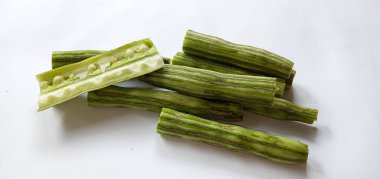 Healthy green vegan super food- Fresh harvested organic Moringa, Limaran, ben-oil, drum stick, horseradish tree, or Malunggay  vegetable. In Indonesia this vegetable is called Sayur Klentang.