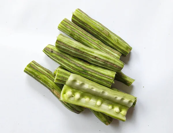 Healthy green vegan super food- Fresh harvested organic Moringa, Limaran, ben-oil, drum stick, horseradish tree, or Malunggay  vegetable. In Indonesia this vegetable is called Sayur Klentang.