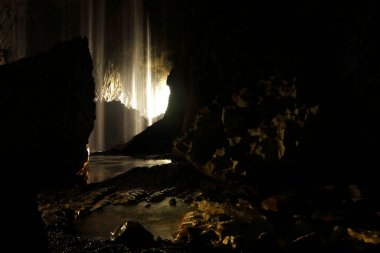 beauty lighting display in the cave with walking path.