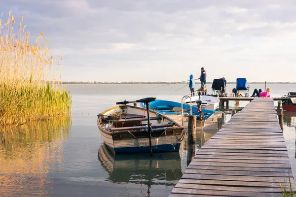 stock image Family vacation at Lake Balaton, Fishing together, Boats, Setting sun, Hungary, Lake Balaton, May 1, 2023