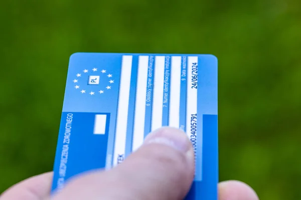 stock image European health insurance card held in hand, Concept, EU document confirming the right to treatment outside of your own country, Travel insurance for Europeans traveling to EU and EFTA countries