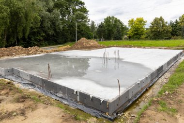 Concrete screed for foundations for building a house clipart