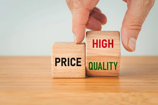 stock image prices, high quality, Hand moving a pad with the word high quality next to the block with the text price, Financial concept, Quality, service, customer satisfaction going hand in hand with the price