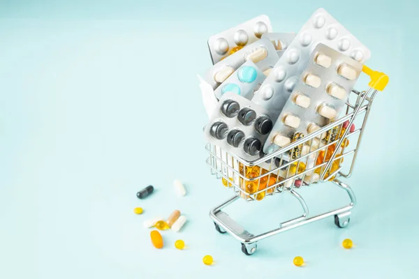 Shopping Cart Full Medicines Abuse Pills Supplements Health Concept Blue — Stock Photo, Image