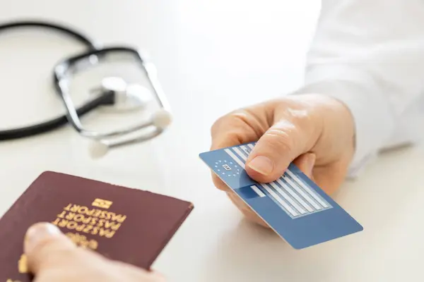 European Health Insurance Card Handed Doctor Doctor Office Concept Travel Stock Photo