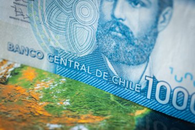 Chile peso against the background of the world, Economic concept of the Chilean currency clipart