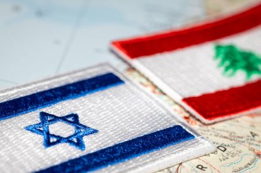 Embroidered flags of Israel and Lebanon, Symbols of countries. Political concept, Situation in the Middle East, Mutual relations clipart