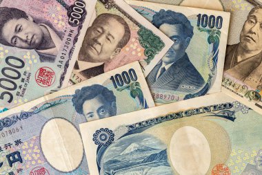 Japonya parası, iş geçmişi. Finansal konsept. Japon yeni ve eski, düz yatıyordu.