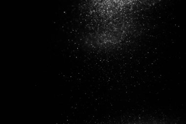 Abstract black background with sparkles and shadows. Fluidity, waves, glitter, fluid, glitter, shimmer. Stars, stardust, space, outer space, comets, placer.